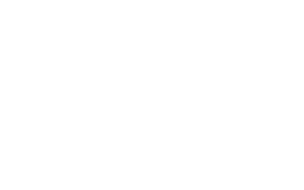 Logo van "WOHNGLÜCK" met een gestileerd "W" in de vorm van een dak, met de tekst "Plannen. Bouwen. Leven.".