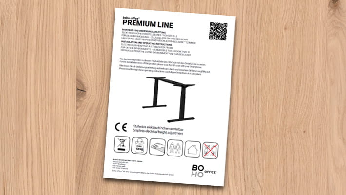 Instructions pour le bureau réglable en hauteur de la ligne PREMIUM de boho office avec pictogrammes et code QR.