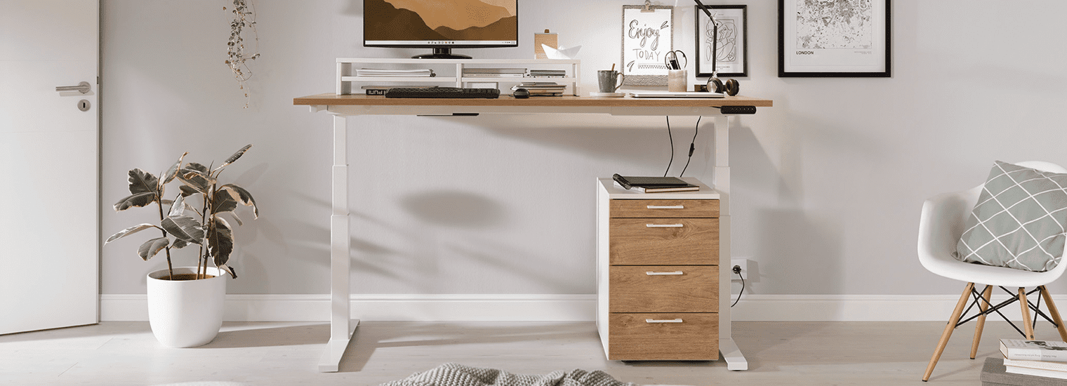 A height-adjustable desk with a wooden top, a rolling cabinet, and modern office elements.